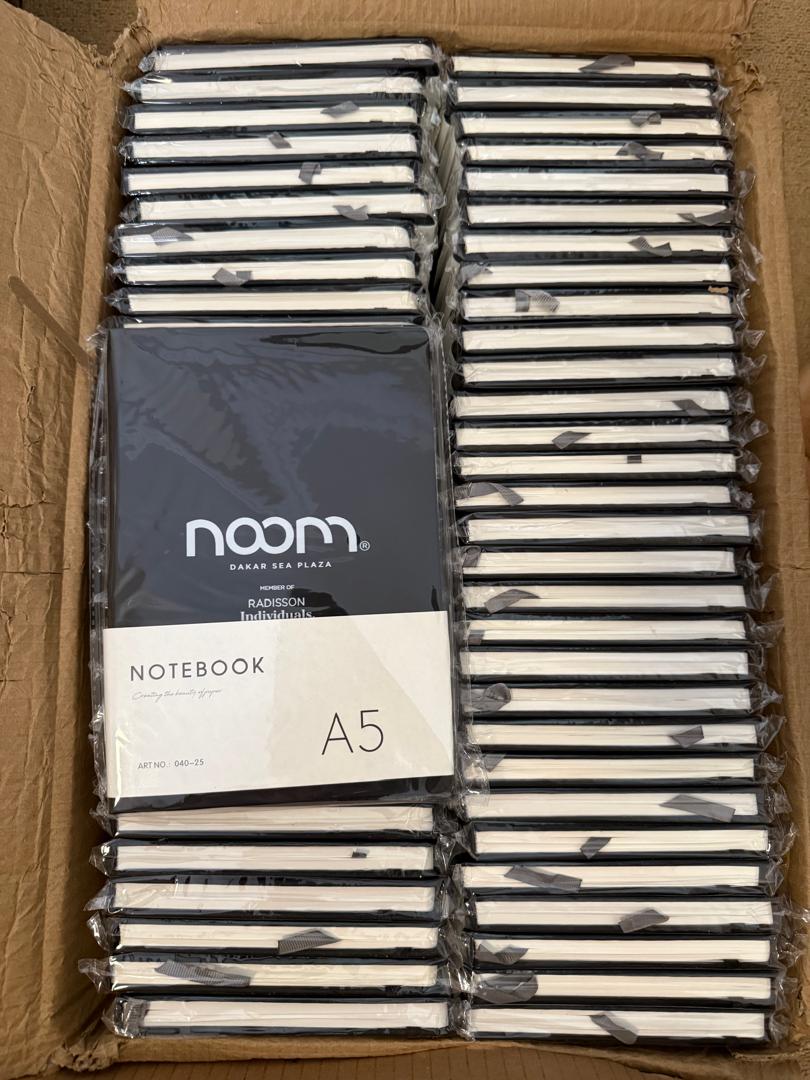 Carton de carnets NOOM prêts à être livrés